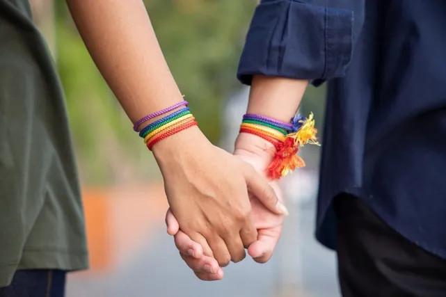 two girls holding hands